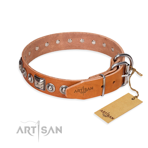 Leather dog collar made of top notch material with rust resistant decorations