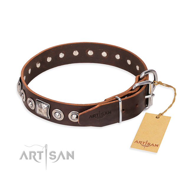 Natural genuine leather dog collar made of soft to touch material with reliable adornments